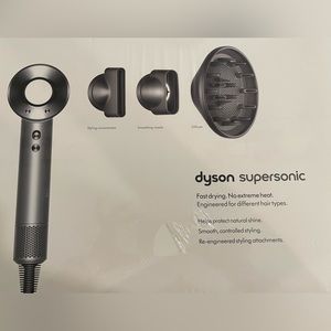 Dyson hair dryer(white)..with 3 attachments. Brand New and sealed!!